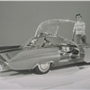 Ford Seattle-ite XXI, 1962 - faked picture, model car in foreground, woman added later.