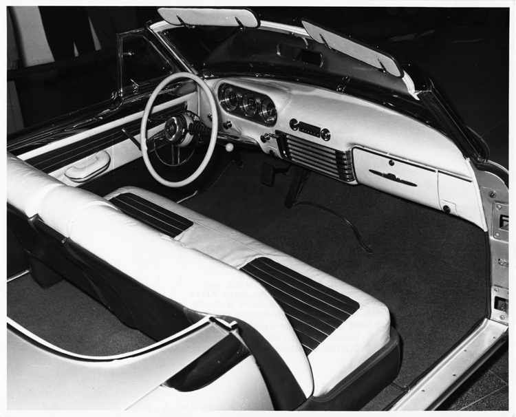 Packard Pan American, 1952 - Interior: top grain oyster white leather on seats, dash, door panels, sun visors & steering wheel, contrasting leather on steering wheel spokes, door trim panels, door handles, pleated seat sections, rear panels of seat backs, this first Pan American exhibited International Motor Sports Show opened 29 March 1952 at Grand Central Palace, New York, N.Y.