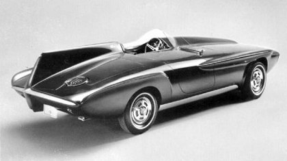 The 1960 Plymouth XNR concept car borrowed a cue from Jaguar race cars and put a tailfin behind the driver. A hard tonneau covers the passenger seat. 