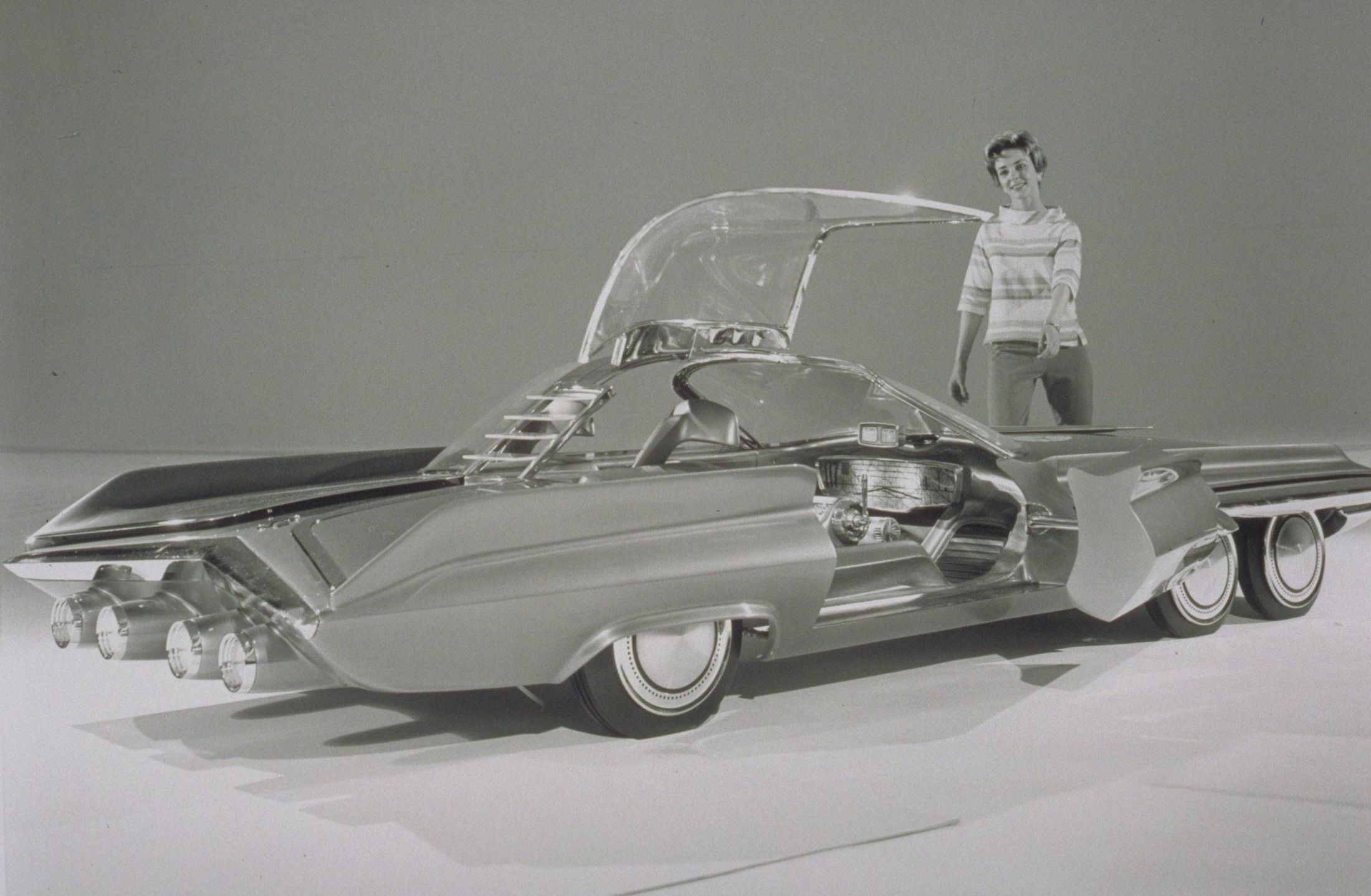 Ford Seattle-ite XXI, 1962 - faked picture, model car in foreground, woman added later.