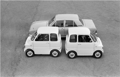 Two Ford Comutas next to a Cortina at a Ford Research centre in Dunton, Essex. 1967 - Photo: Wesley/Keystone/Getty Images
