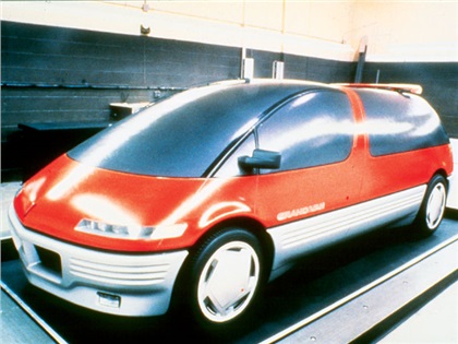 A full-scale clay mockup is completed by sculptors. The mockup is not painted but covered with thin plastic sheets, known as Di-Noc. This sheeting simulates painted and glass surfaces. A mold will be made from the clay model to construct the composite body panels.