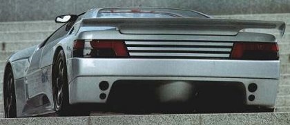 The twin-turbo V-6 of the 1988 Peugeot Oxia concept car was in the tail.