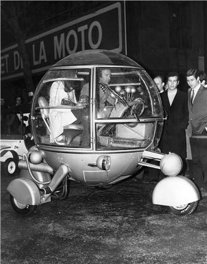 A car of totally new design, the automodul, driven by its designer J. P. Ponthieu, at the opening of the first Racing Car and Cycle show in Paris. 21st February 1970 - Photo: Keystone/Getty Images