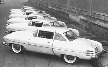 This is a Touring factory photo of six 1954 Hudson Italia autos, ready to ship to the U.S.  Only 25 of these cars were built + a prototype coupe and one 4-door.