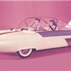 Ford FX Atmos, 1954 - Supposedly Arbib and model Bettie Page are sitting in the car in the 1954 Ford publicity picture of the Ford FX Atmos and that he designed it.