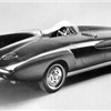 The 1960 Plymouth XNR concept car borrowed a cue from Jaguar race cars and put a tailfin behind the driver. A hard tonneau covers the passenger seat. 