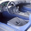 The 1988 Peugeot Oxia concept car interior drew on solar cells for electrical power. The dashboard included a computer and a map display.