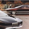 The 1988 Cadillac Voyage concept car (foreground) and the 1989 Cadillac Solitaire concept car (background) were designed for high-speed travel.