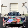 Tesla Roadster Art Car bay Laurence Gartel (2010)