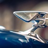 Intricate winged Bentley badge shown for new Flying Spur