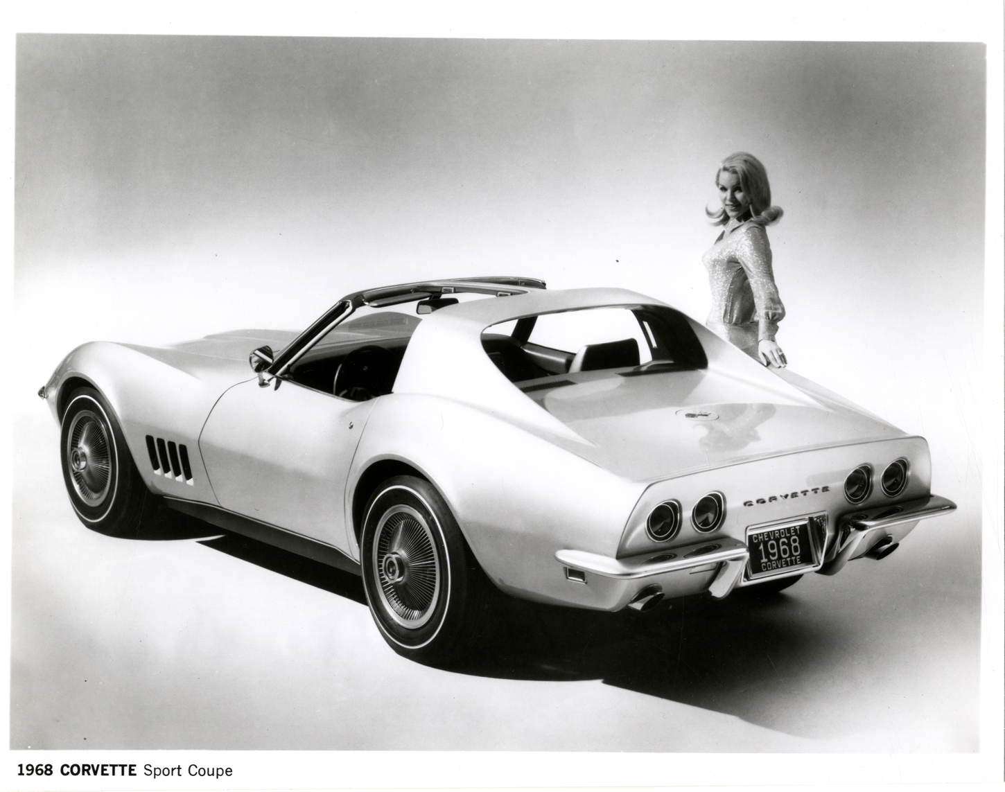 The revolutionary coupe roof design includes removable panels and rear window for sophisticated open-air driving. The Mako Shark-bred Corvette boasts of longer and lower aerodynamic lines that are enhanced by a graceful sloping hood and retractable headlamps. Grille, rear deck and recessed taillights are all new. Both coupe and convertible have a new ventilation system with full door glass styling. Concealed windshield wipers and light monitoring system are standard 1968 Corvette features.