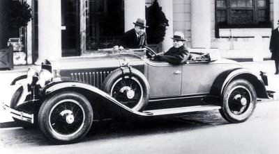 La Salle, 1927 - Harley Earl at the wheel of a 1927 LaSalle, Larry Fisher standing, at Copley-Plaza Hotel.