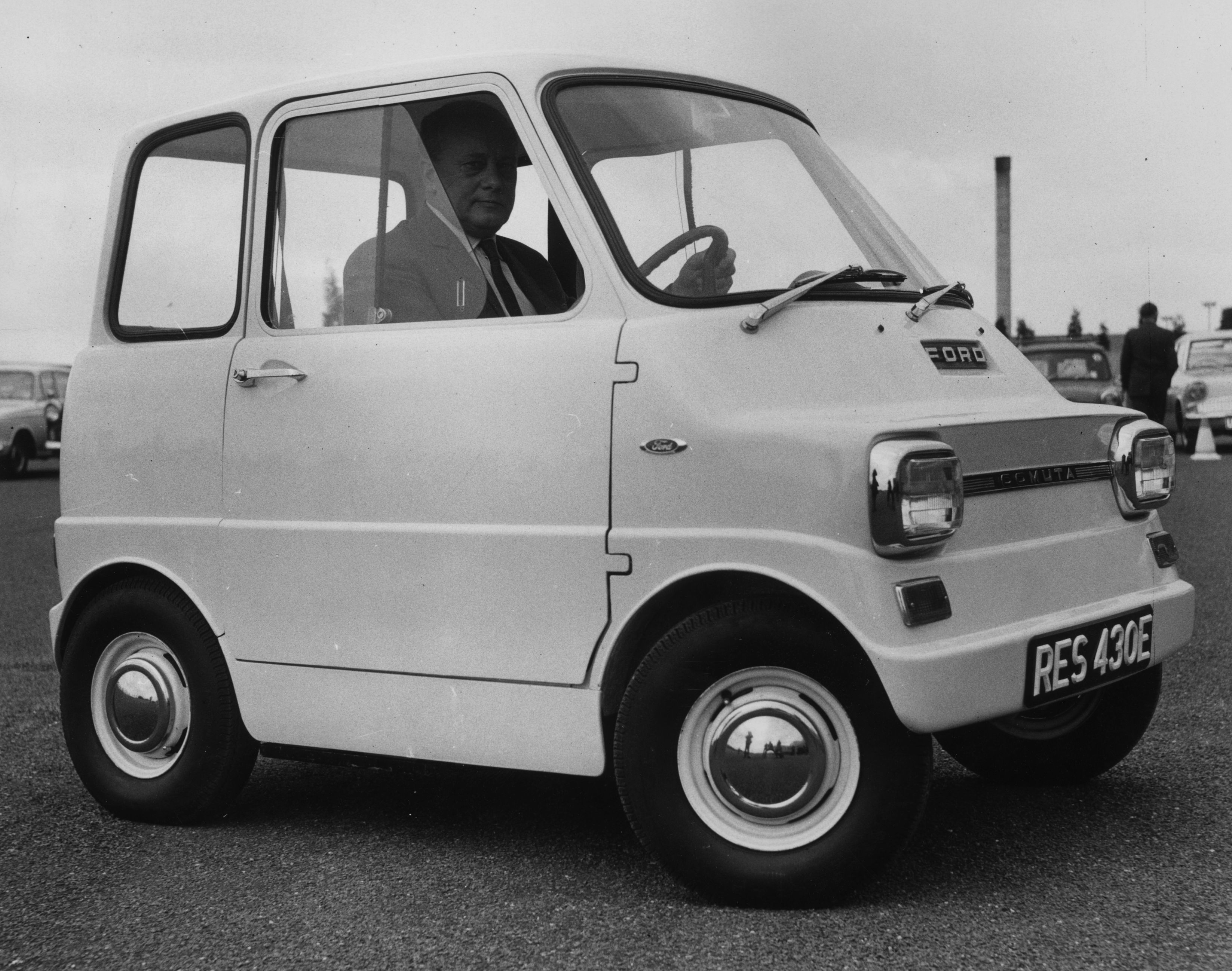 Manager of Ford research Laurence Martland in an electric “Comuta” which is designed to carry two adults and two children, 7th June 1967 - Photo: Mike McLaren/Central Press/Getty Images
