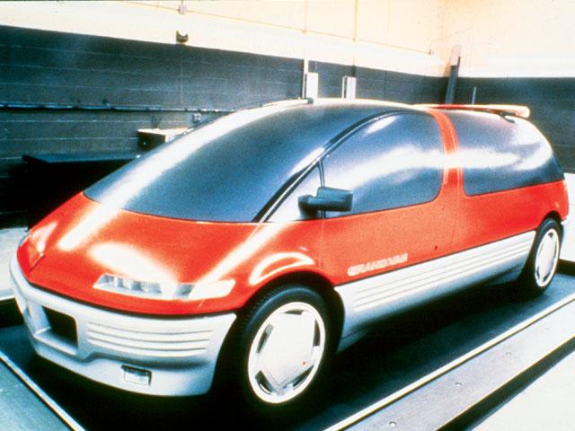 A full-scale clay mockup is completed by sculptors. The mockup is not painted but covered with thin plastic sheets, known as Di-Noc. This sheeting simulates painted and glass surfaces. A mold will be made from the clay model to construct the composite body panels.