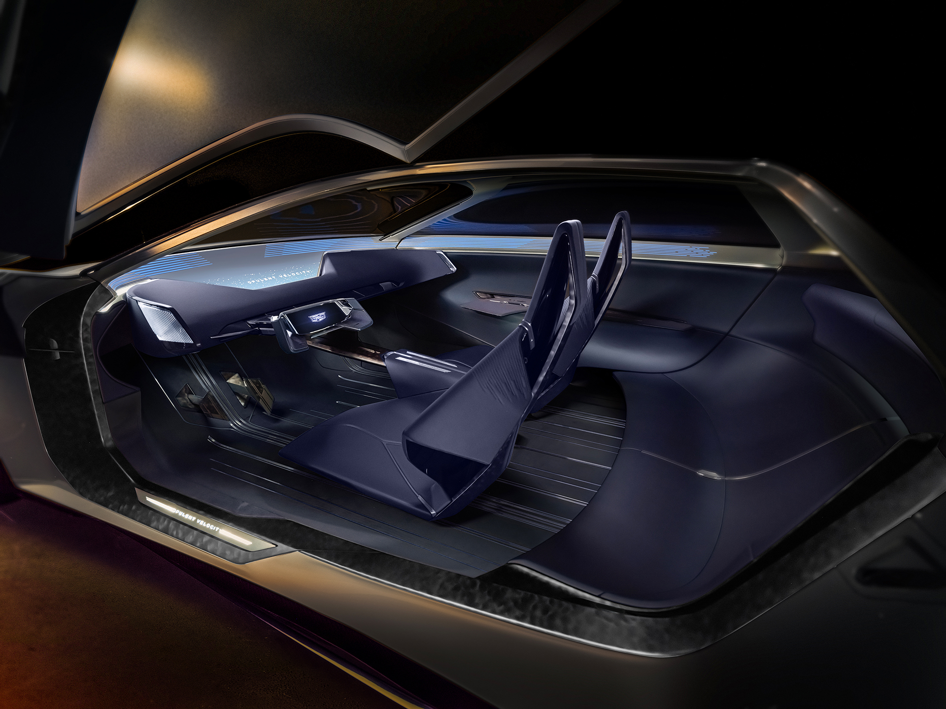 Interior view of Cadillac Opulent Velocity concept vehicle in Selene Metallic dark blue, featuring 2+2 seating configuration.