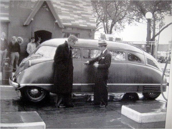 William Stout, left, with a Scarab. 