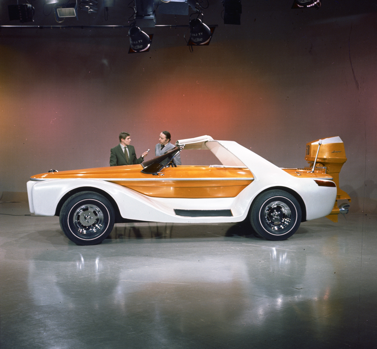 Evinrude Rooney Lakester (1970) - Brooks Stevens being interviewed next to Rooney Lakester
