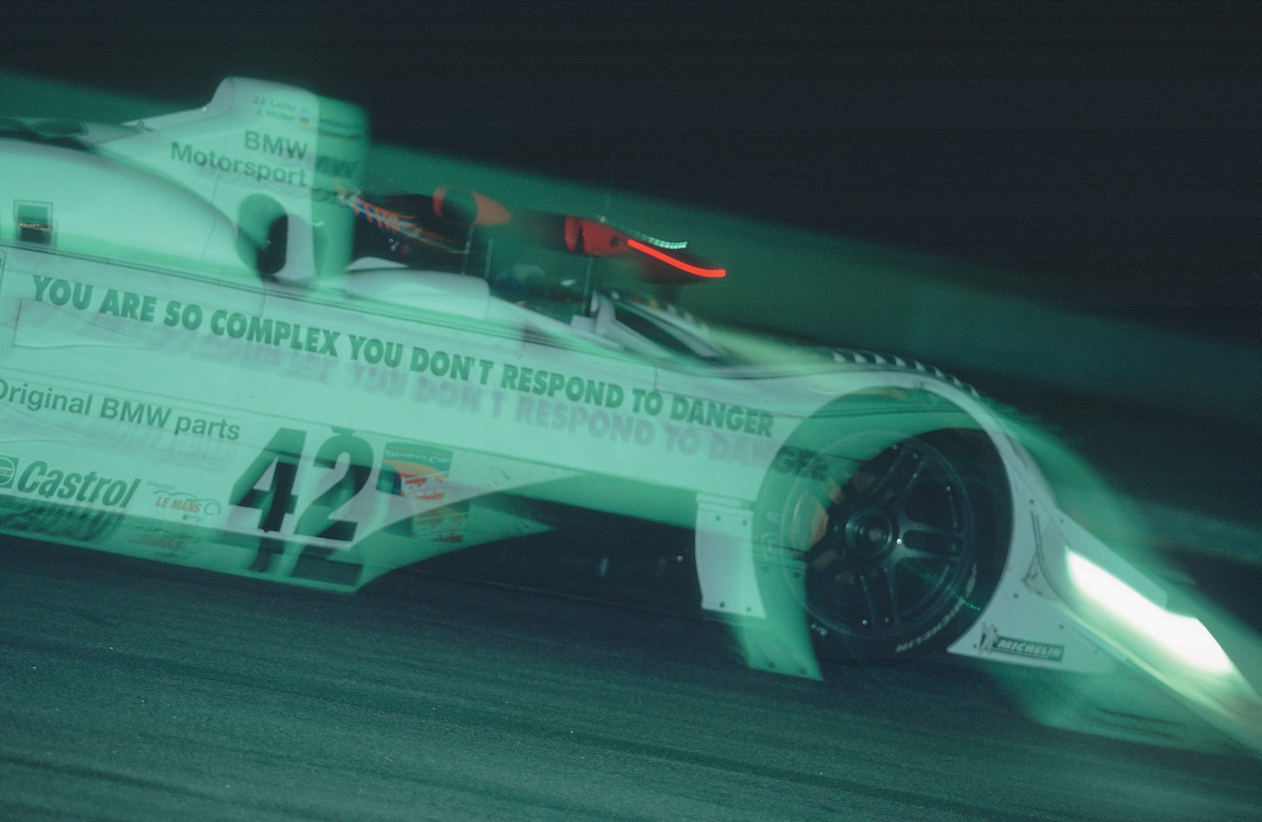 BMW V12 LMR Art Car # 15 (1999): Jenny Holzer