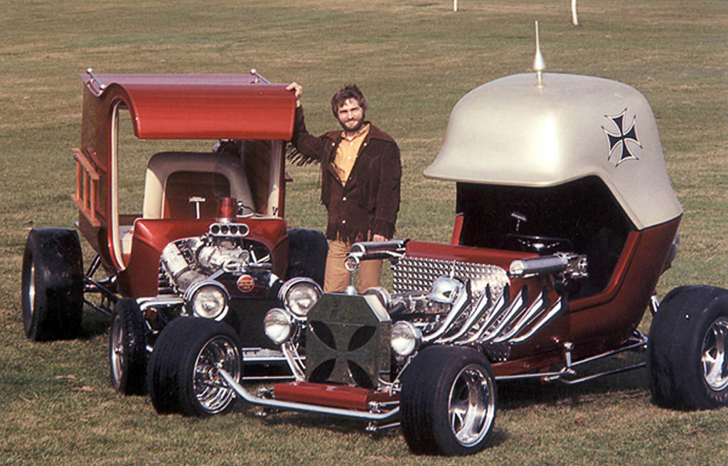 Chuck Miller poses with his Fire Truck and The Red Baron in the 1970s